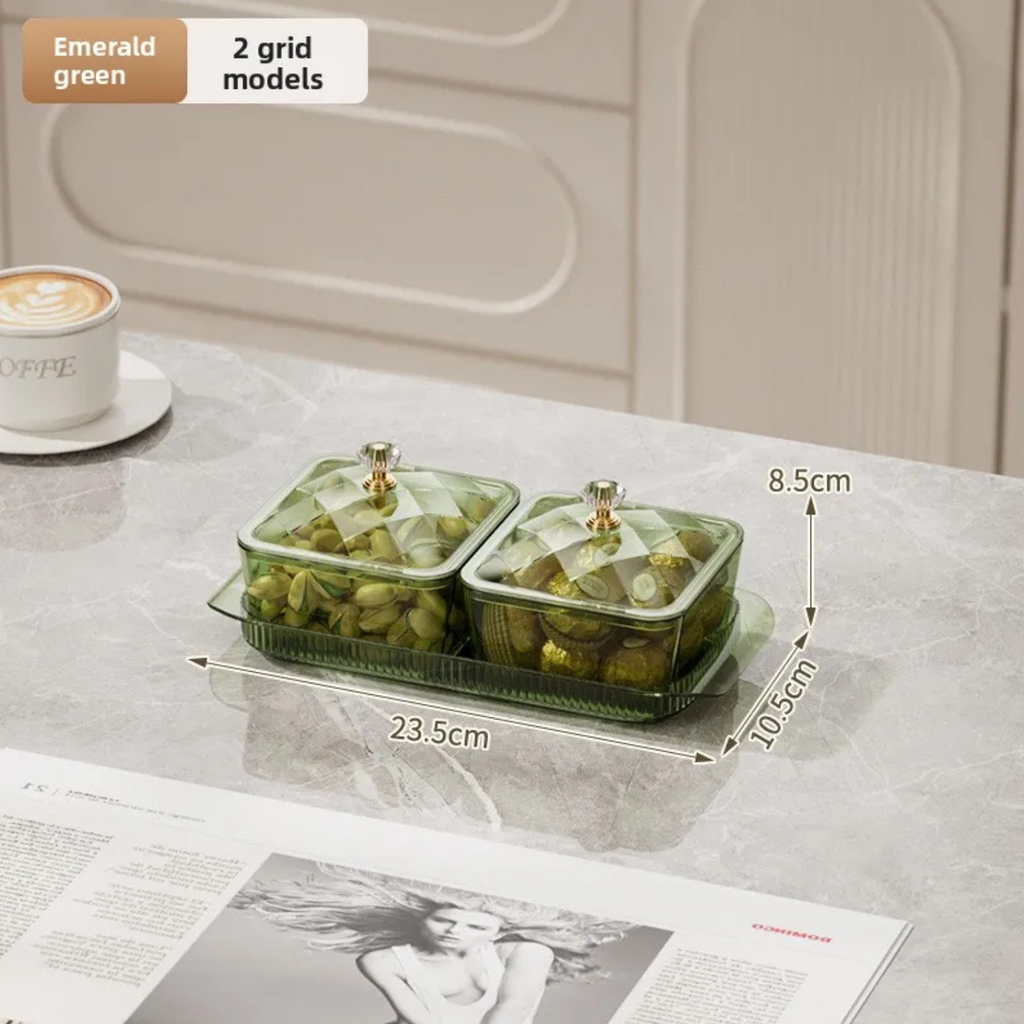 Two-section snack bowl with lid and tray, emerald green compartments with snacks