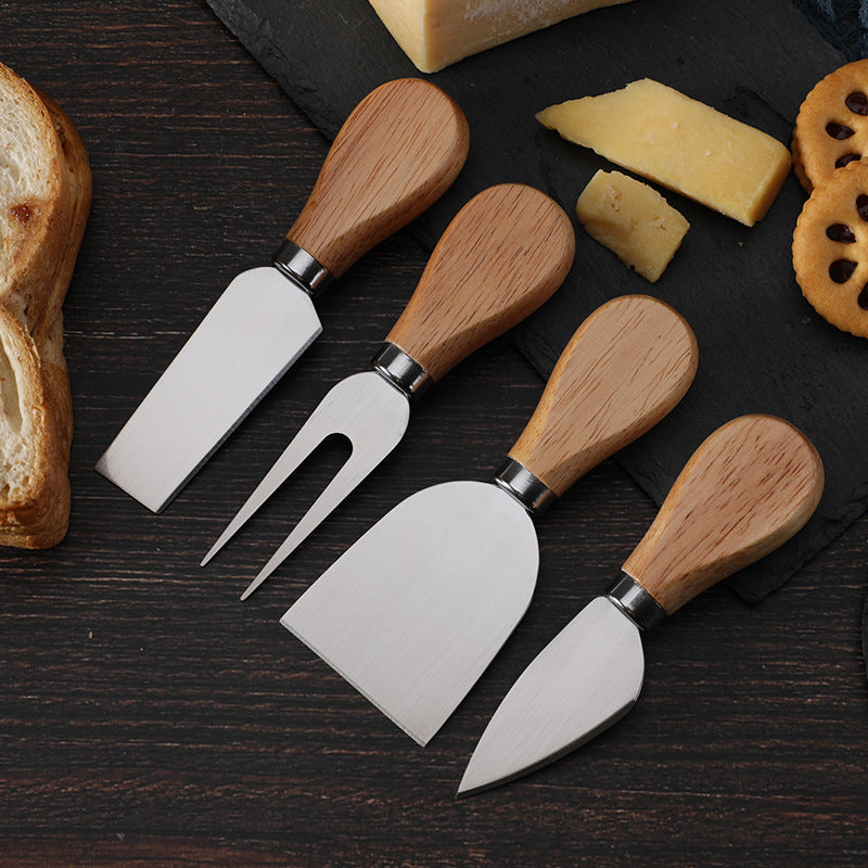 Silver cheese knife set with wooden handles: fork, wedges and spreader blades