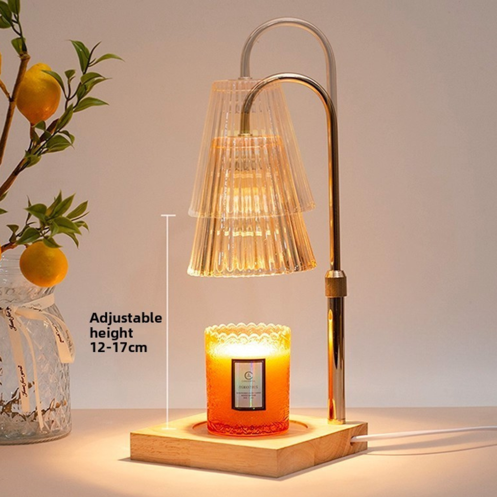 Adjustable-height wax warmer lamp with ribbed glass shade, gold stem, wooden base