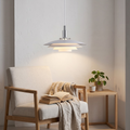 White layered pendant light with three-tier shades and chrome mounting