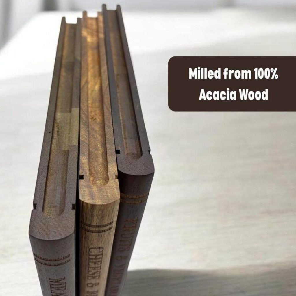 Close-up of acacia wood cutting board spines and stand, dark and light panels