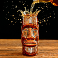 Amber ceramic tiki mug with moai face design, 420ml capacity