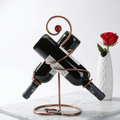 Copper wire 2-bottle wine rack with curved top stand and base ring