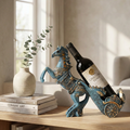 Decorative resin horse wine bottle holder, blue horse with ornate saddle and dark bottle