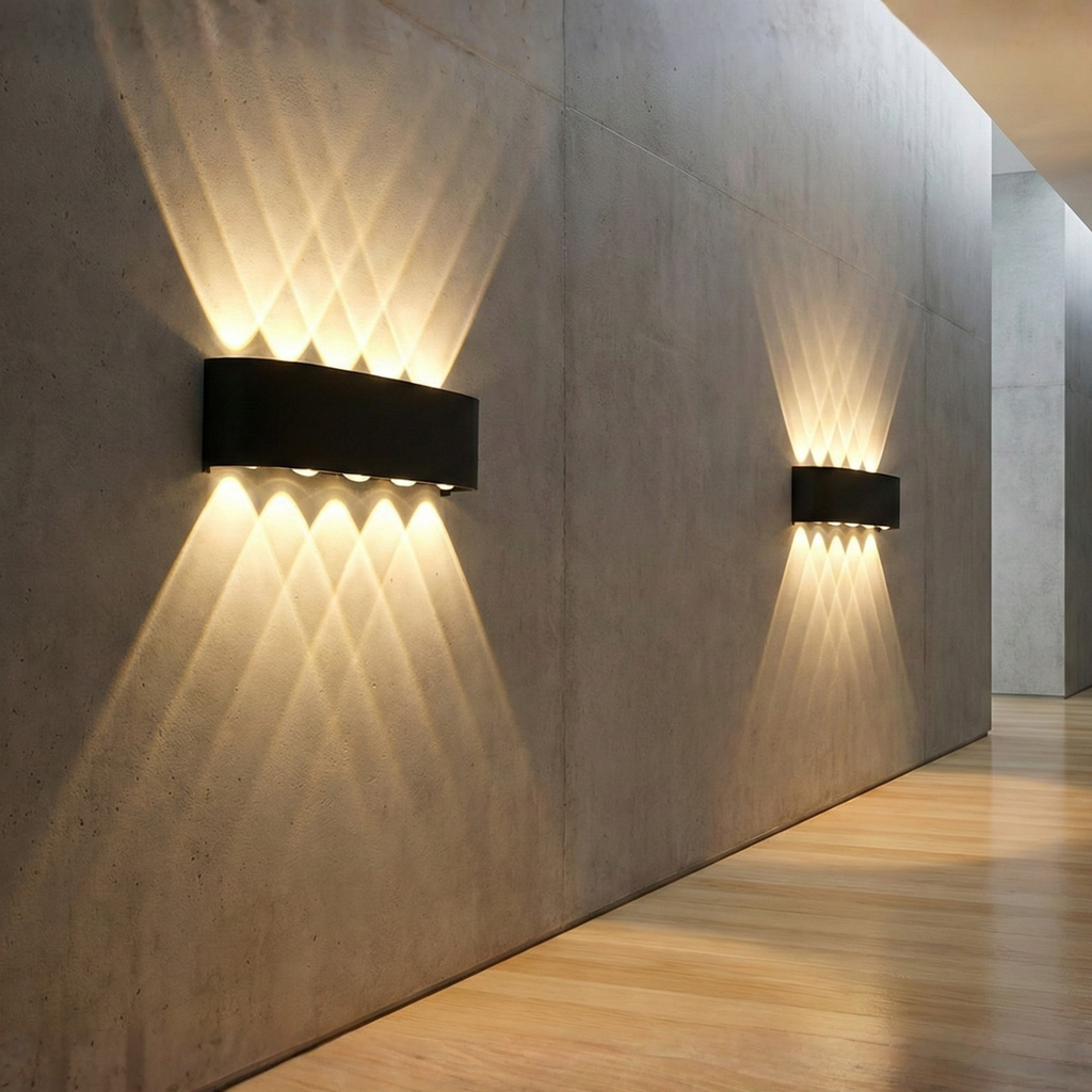 Indoor/outdoor up-down LED wall sconce, cool white light, black mount