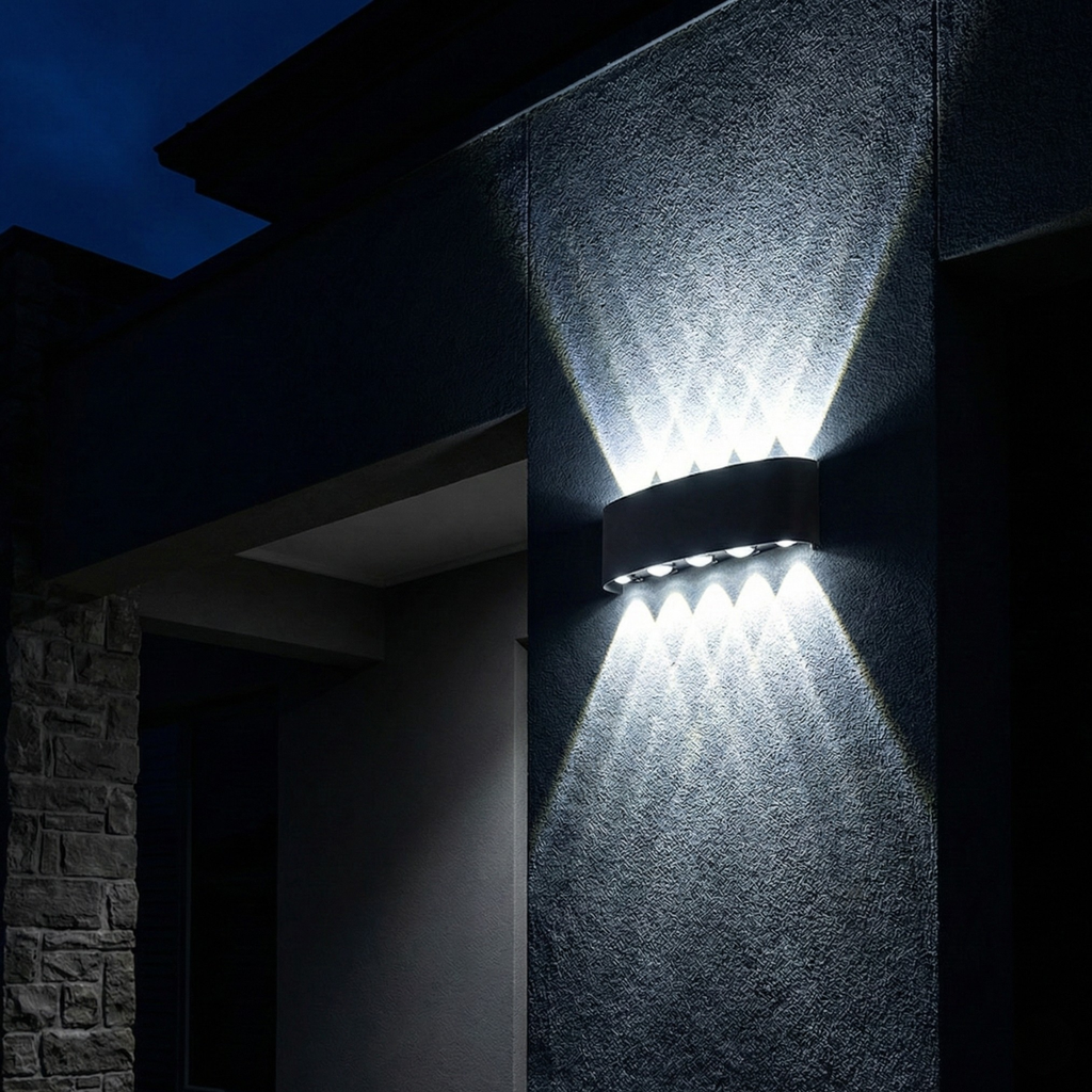 LED up-down wall sconce with cool white light, black housing