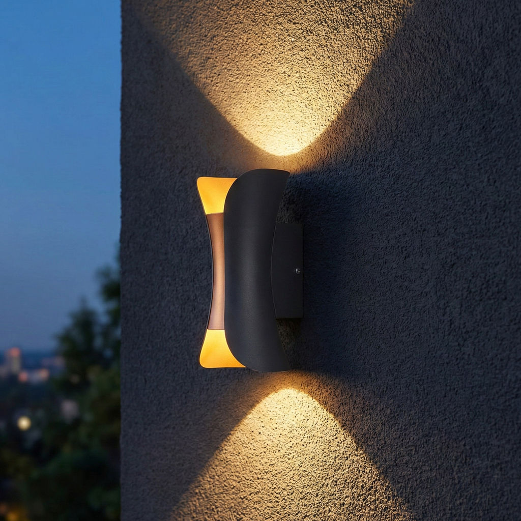 Close-up black LED up-and-down wall sconce with warm-white light output