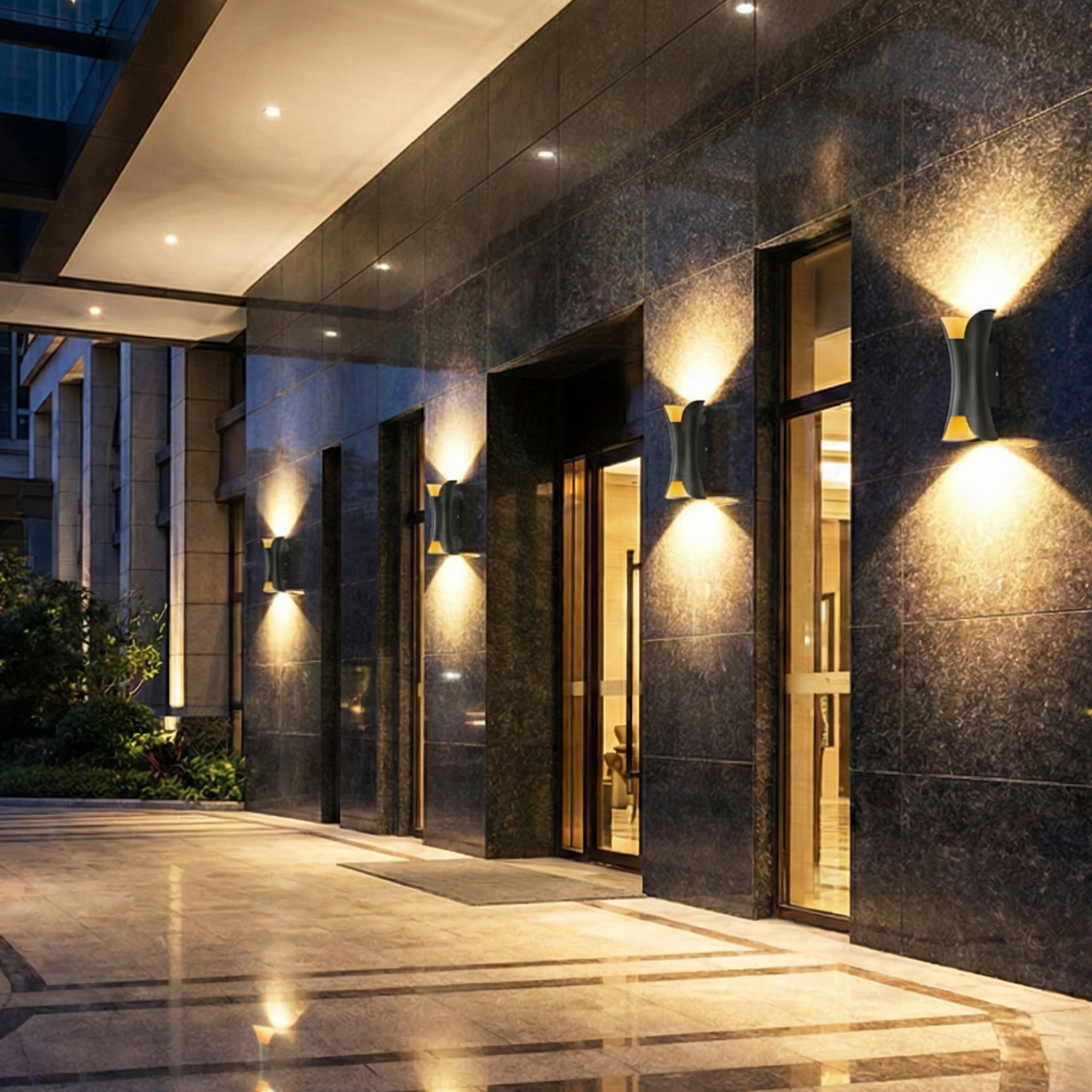 Multiple black LED up-and-down wall sconces with illuminated dual beams, warm tone