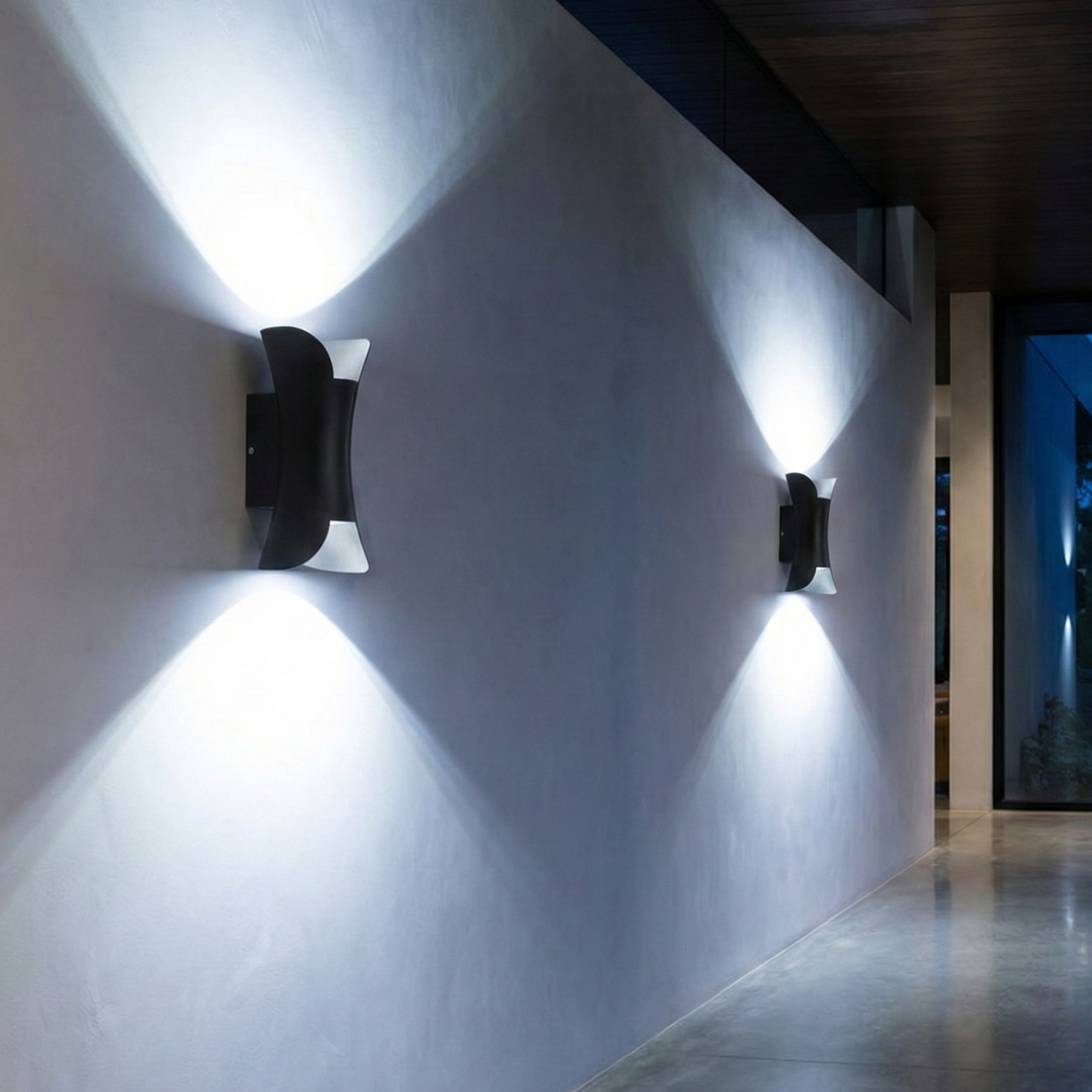 Black LED dual up-and-down wall sconce with cool-white illumination