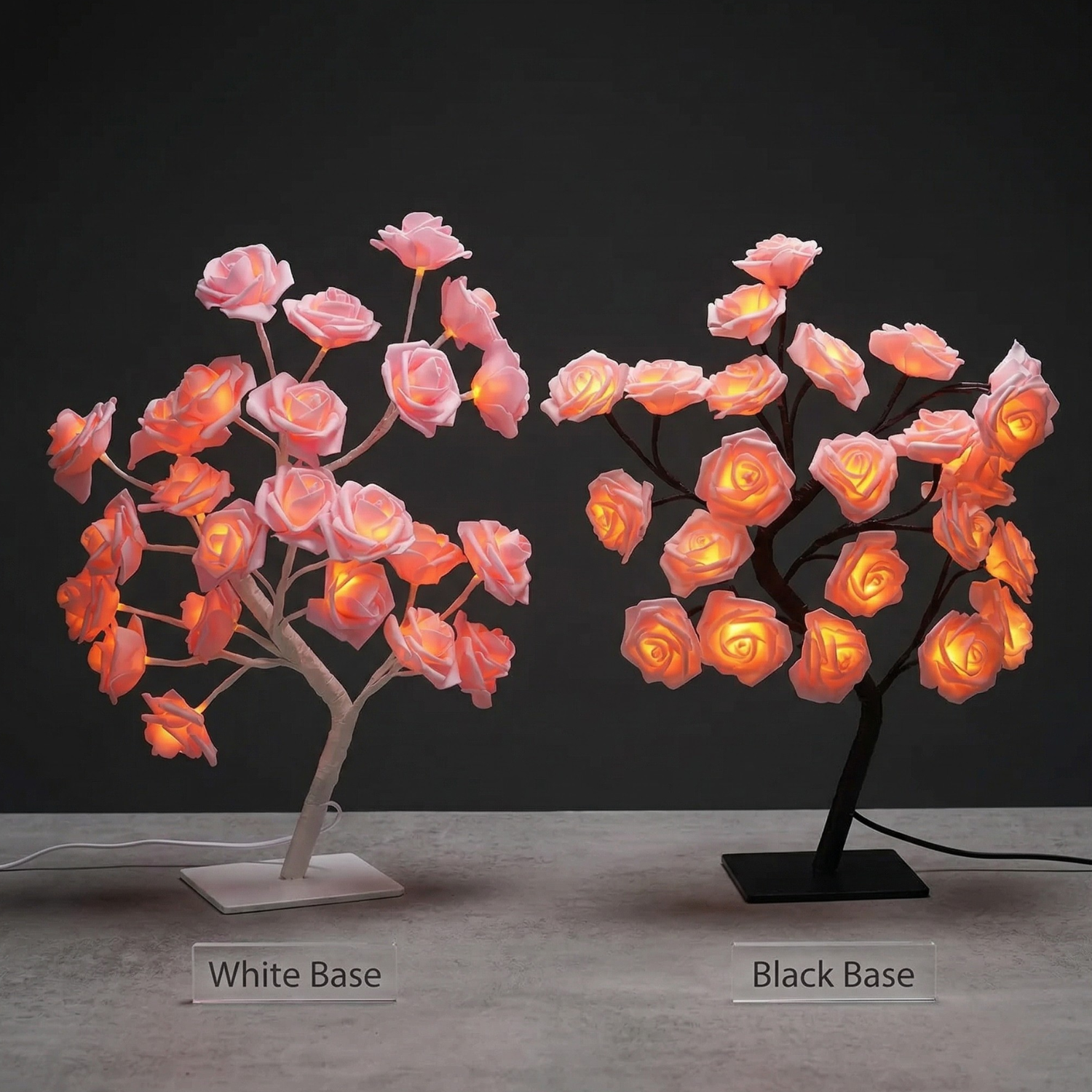 Two LED rose tree lamps: pink roses on white and black bases