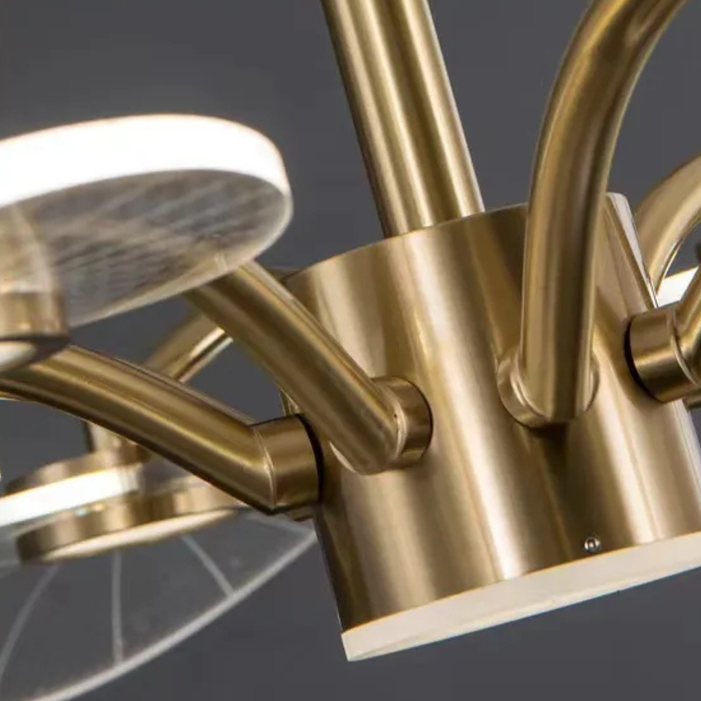 Close-up of gold lotus leaf LED chandelier arms and central mounting plate