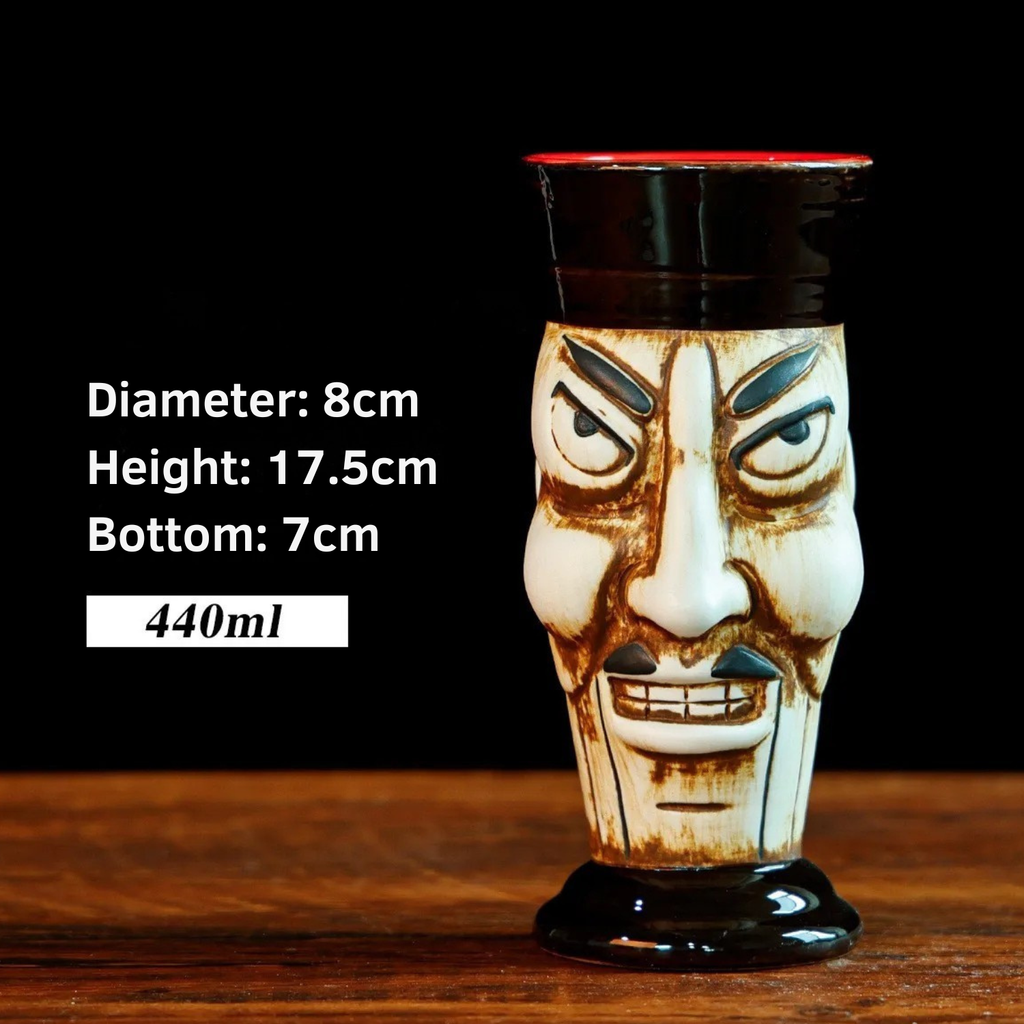 Ceramic mug with face design on a wooden surface, showing measurements and capacity.