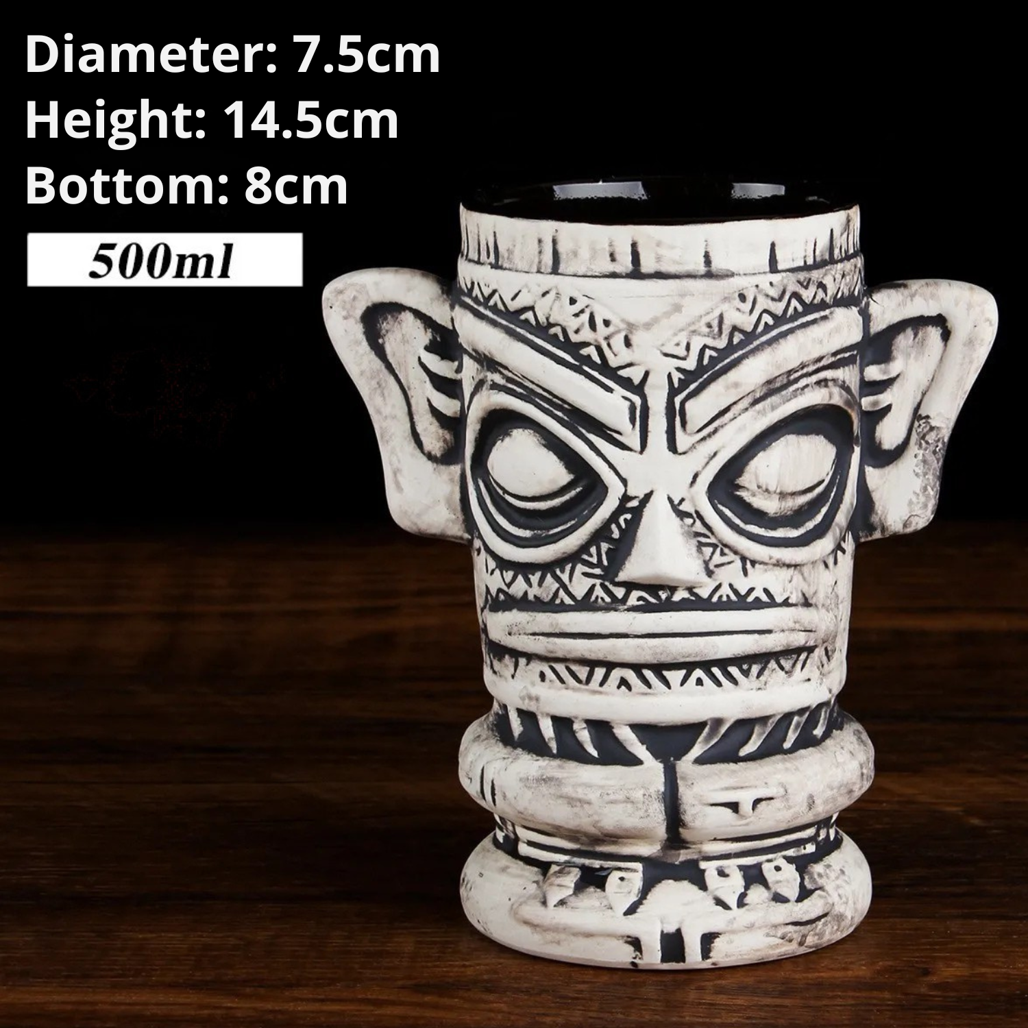 Ceramic mug with tribal design on a wooden surface