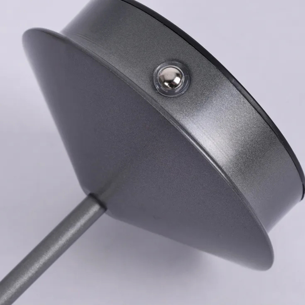 Close-up of a gray metal object with a white background