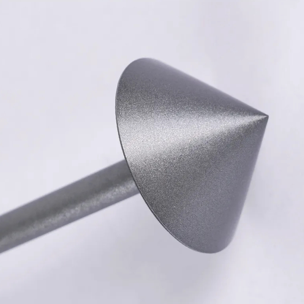 Metallic cone-shaped object on a white background