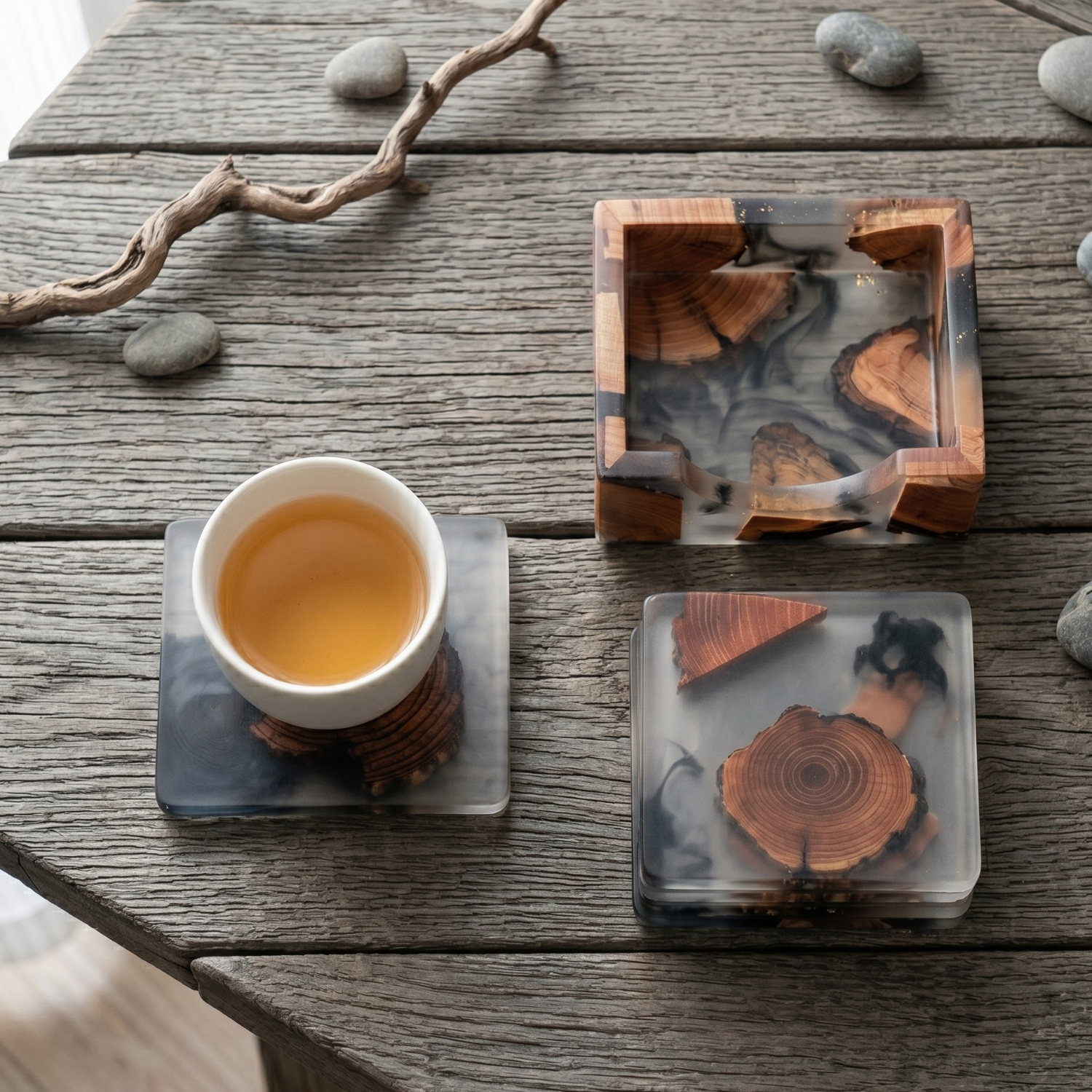 Square resin wood coasters—orange pine slices in clear epoxy trays, tea-time setup