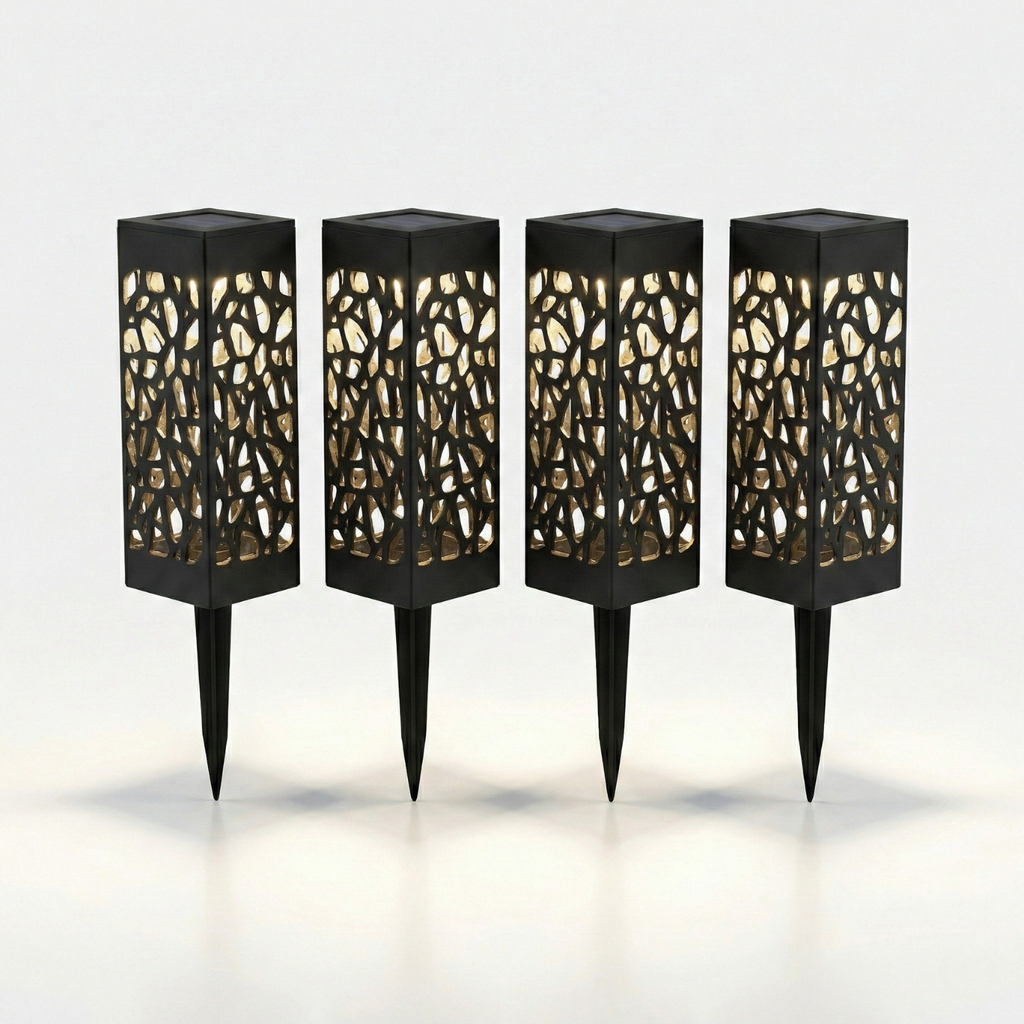 Four black outdoor lamps with decorative cut-out designs on a white background