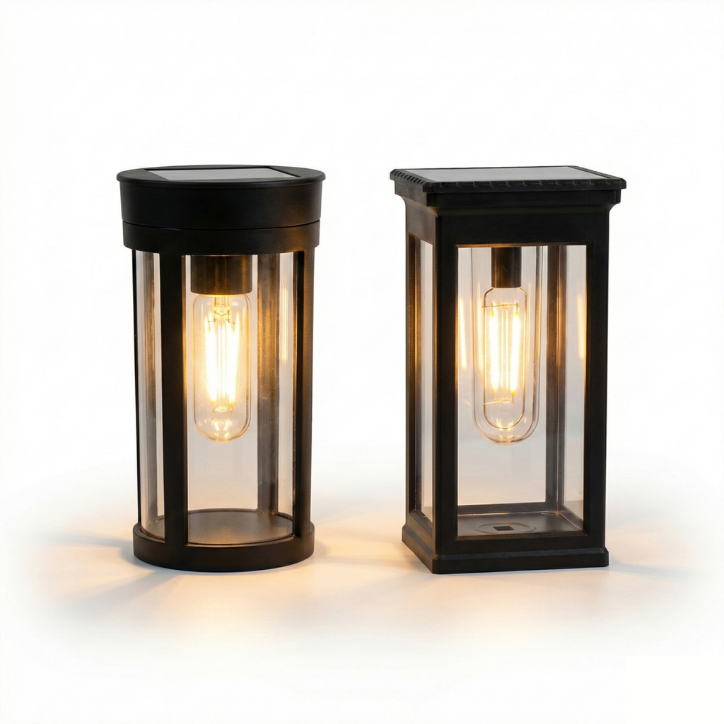 Two solar-powered outdoor lights with clear glass shades on a white background