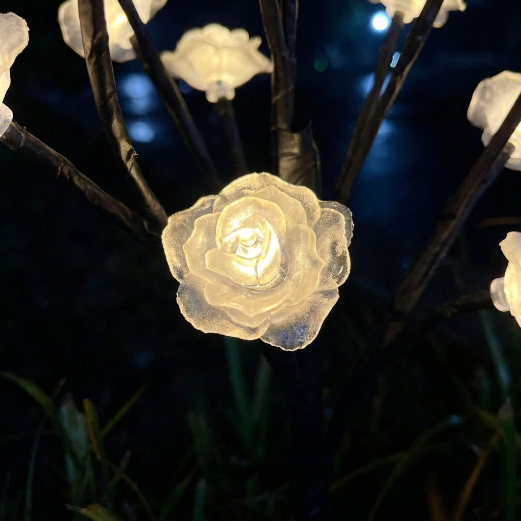 Decorative string lights shaped like roses on a dark background