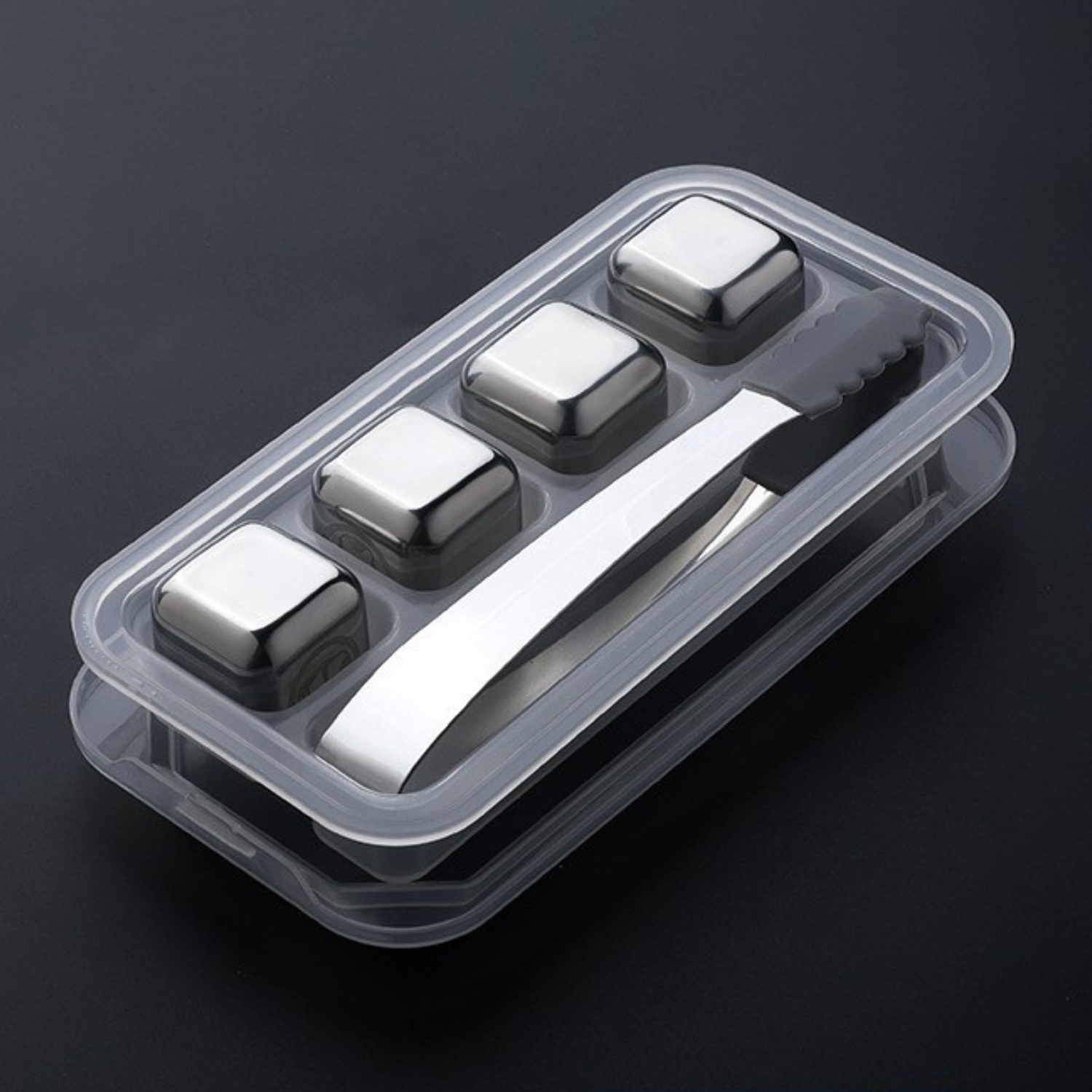 Titanium ice cubes 4-pack with tongs in a clear tray