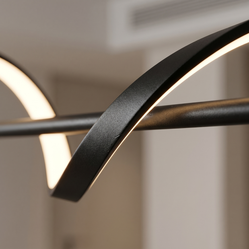 Close-up of black wavy LED strip, continuous illuminated curve