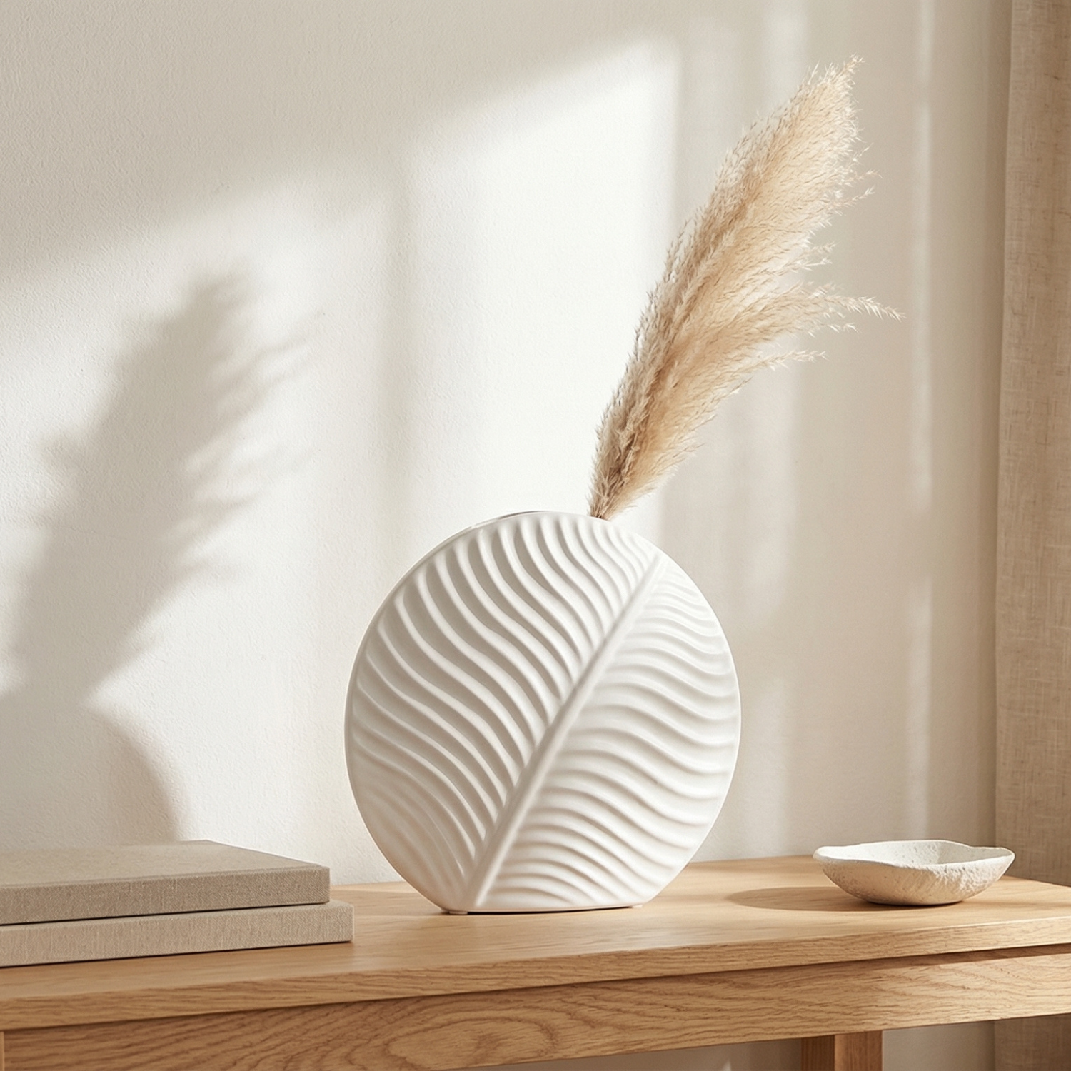 White textured vase on a wooden surface with a neutral background
