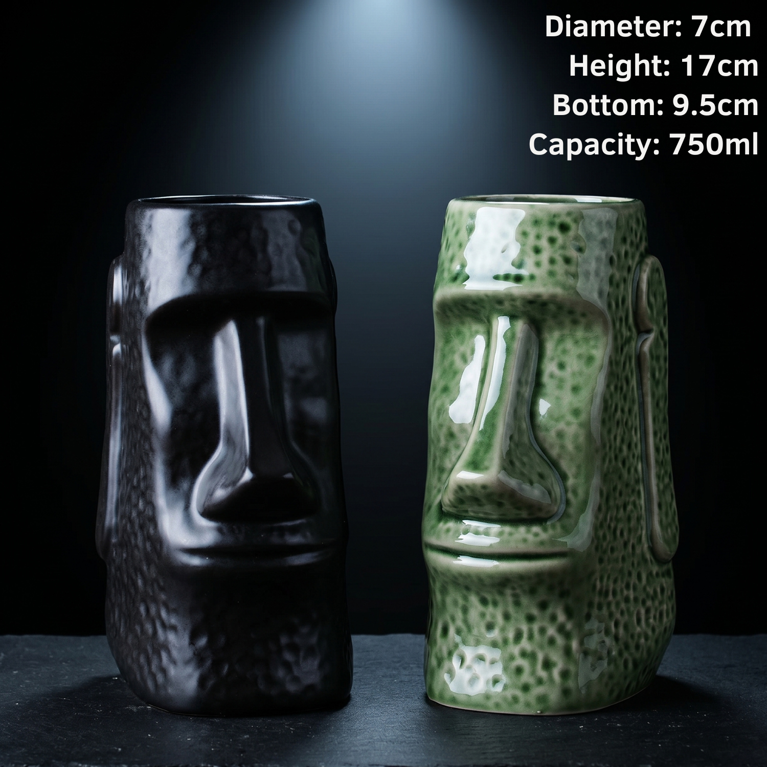 Two ceramic mugs shaped like Moai statues, one black and one green, on a dark background with measurements displayed.