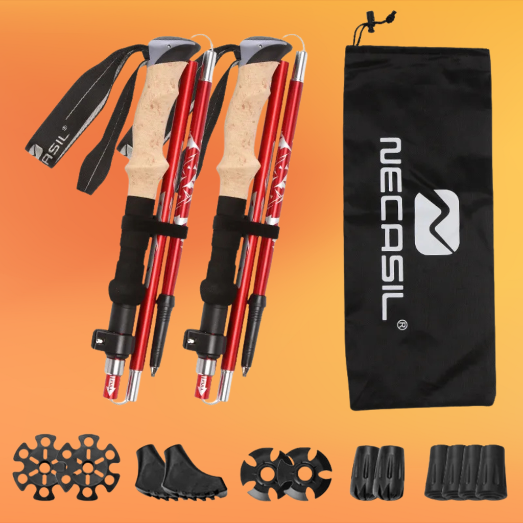 Two red hiking poles with accessories and a black carrying bag on an orange background